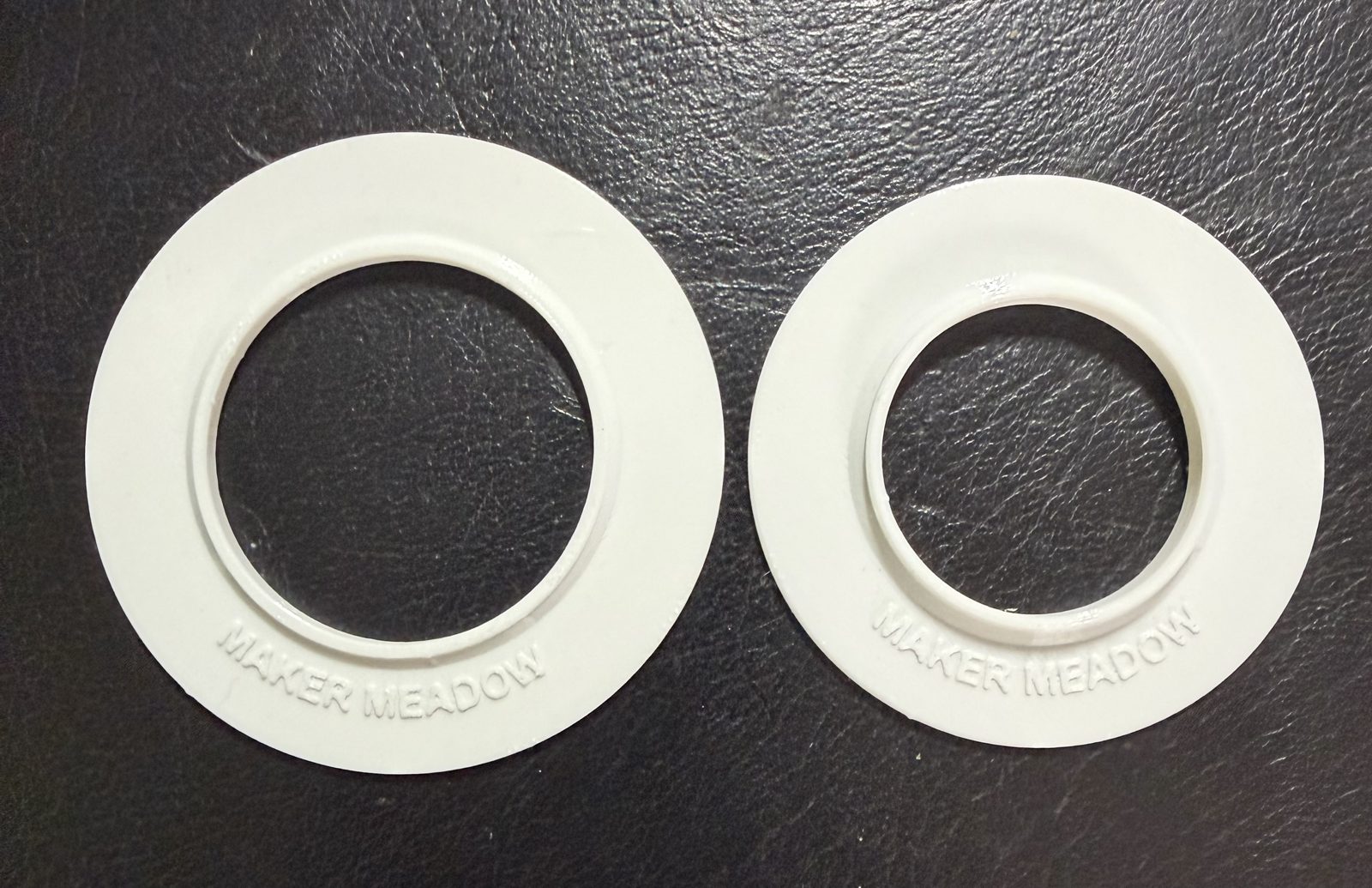 Pair of white Trim-Fit wall collars